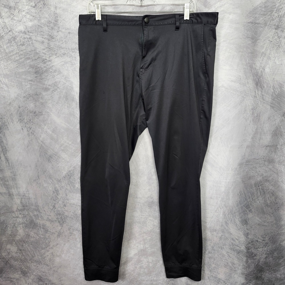Rhone Commuter Jogger Pants *Hole* Mens 34 Black Flex-Knit Stretch Performance
